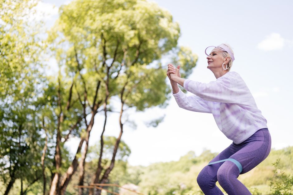 A healthy active woman exercising outdoors — consistent movement supports blood sugar stability and overall wellness