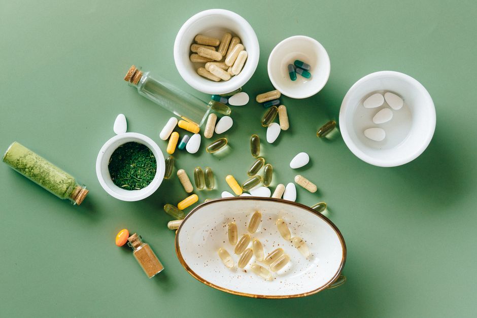 Natural herbal supplements and botanicals in ceramic bowls — the 9 ingredients in this blood sugar support formula